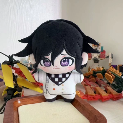 Shadora Danganronpa plush toys featuring Kokichi Oma, Chiaki Nanami, and Nagito Komaeda displayed together.
