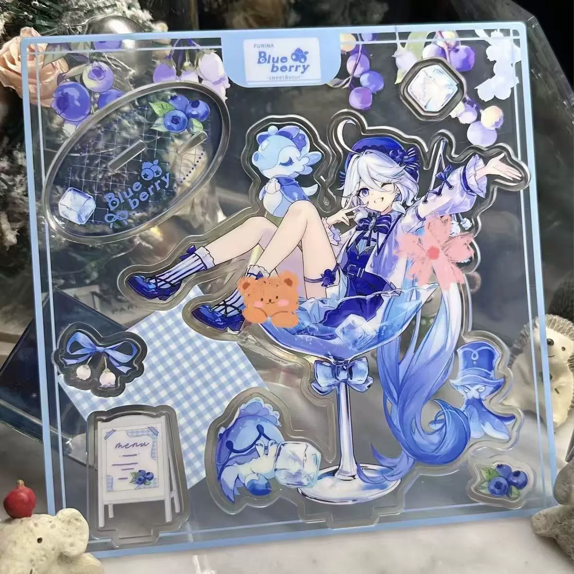 Acrylic stand featuring Furina from Genshin Impact by Shadora, showcasing the character figure on a clear display stand.