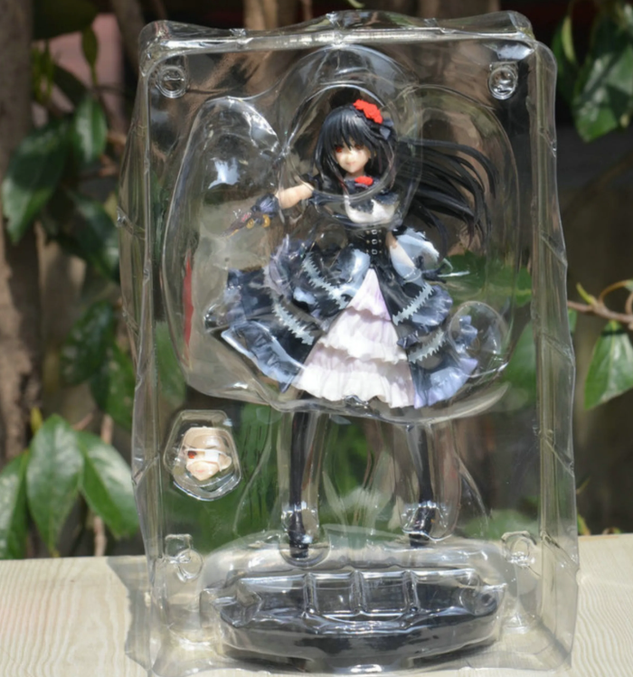 Kurumi Tokisaki figure by Shadora featuring detailed armor, long black hair, and a dynamic pose on a clear display base.