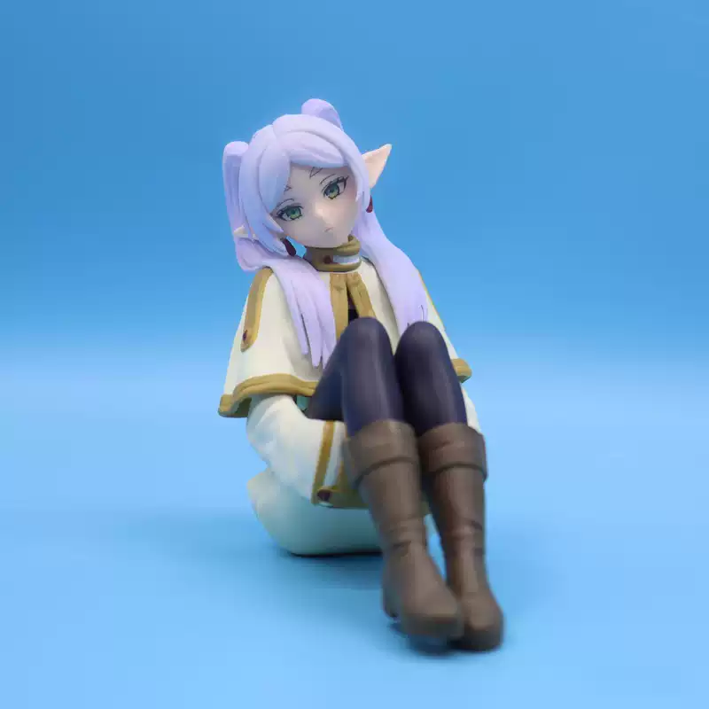 Shadora Frieren figurine displayed on a surface, detailed character design, with vibrant colors and intricate costume details.